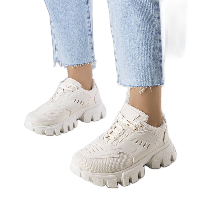Beige sneakers with a massive sole from Inez
