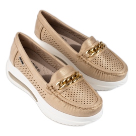 SHELOVET Women's gold loafers Slovet on the platform golden