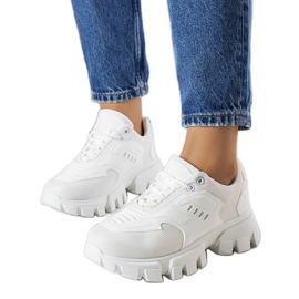 White sneakers on a massive Inez sole White sneakers on a massive Inez sole