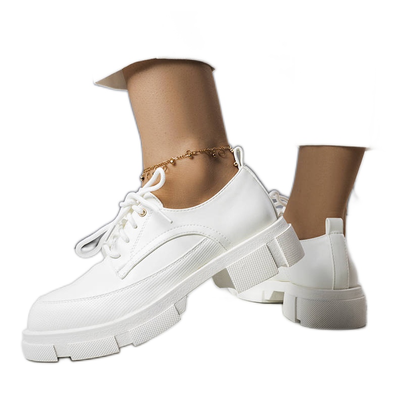White shoes with a massive sole from Kay