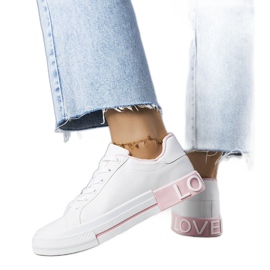 White and pink sneakers decorated with the Nora inscription White and pink sneakers decorated with the Nora inscription