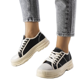 Black platform sneakers from Nichole
