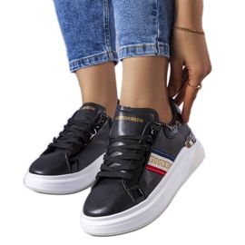 Black shoes with patent inserts from Annot