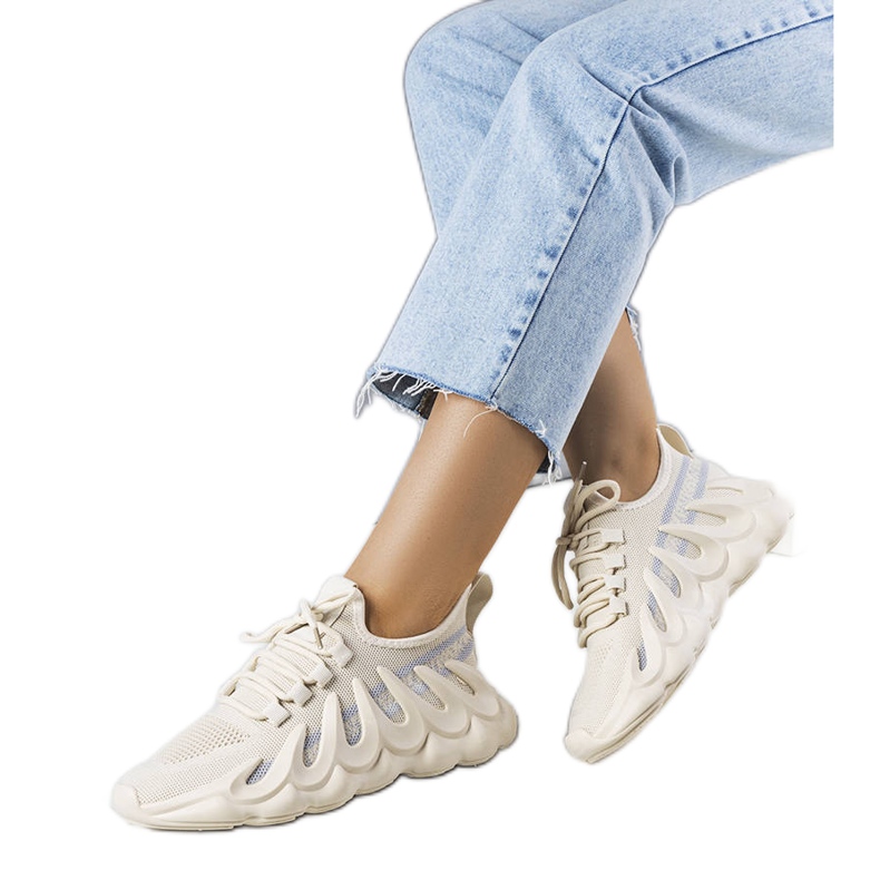 Beige sneakers on a fashionable Beth sole