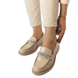 Beige loafers with rhinestones from Colette