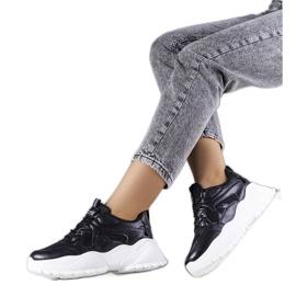 Black sneakers on a massive Lorene sole Black sneakers on a massive Lorene sole