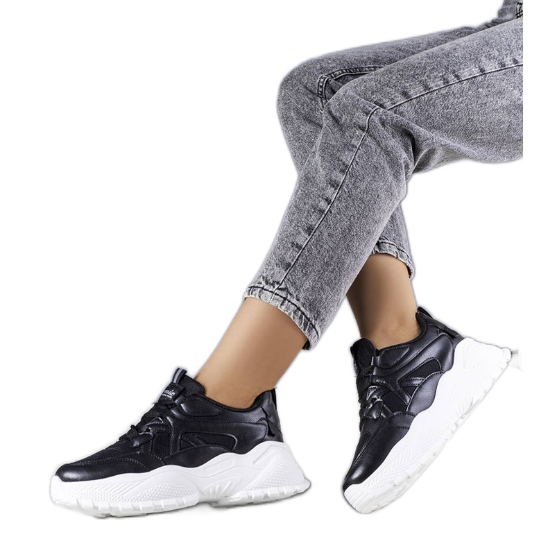 Black sneakers on a massive Lorene sole Black sneakers on a massive Lorene sole