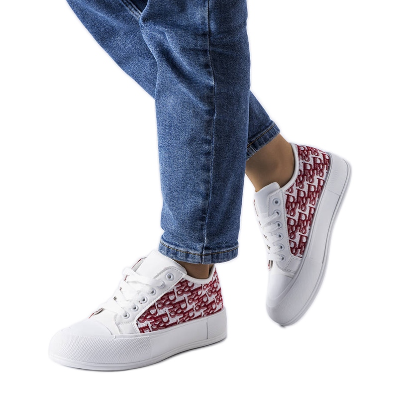 White sneakers with a red Marquis pattern