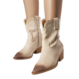 Classic beige cowboy boots from Ernestine