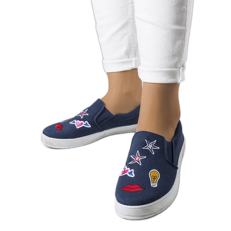 Navy blue sneakers with patches from Anais