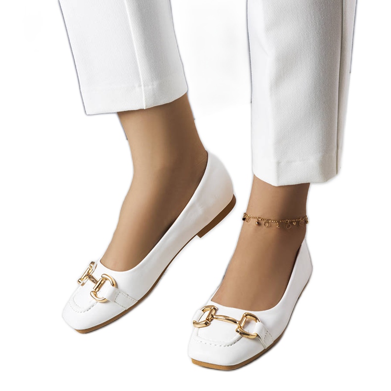 White ballerinas with gold Iris decoration White ballerinas with gold Iris decoration