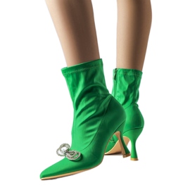 Green boots decorated with a zircon Mars bow