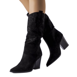 Black cowboy boots with an openwork upper from Guibord