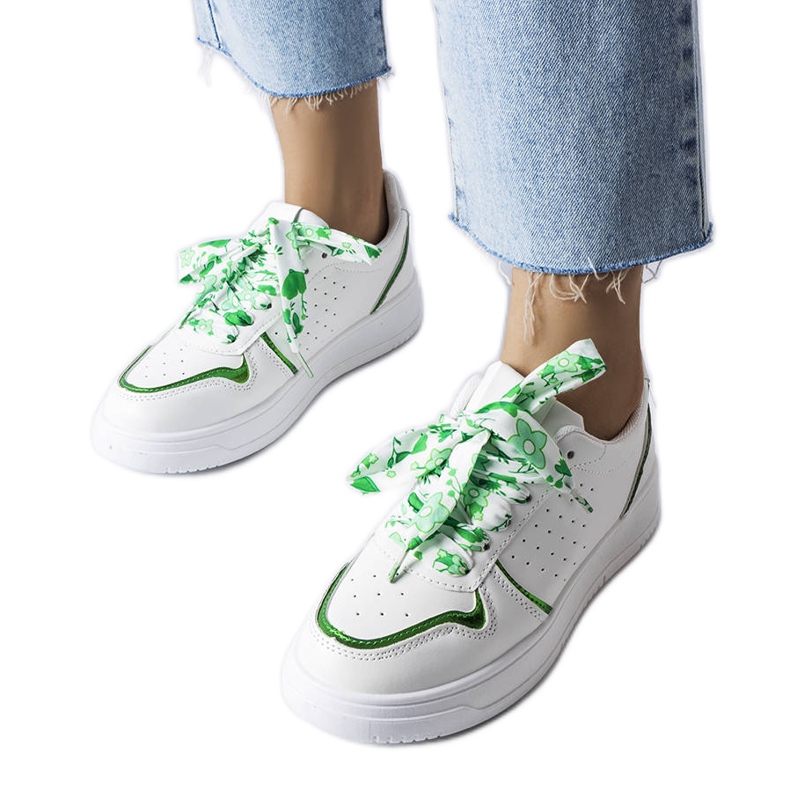 White sneakers tied with Pryor ribbon White sneakers tied with Pryor ribbon