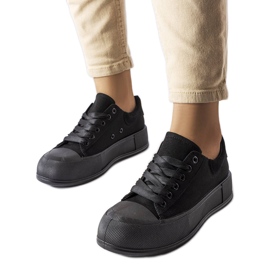 Black platform sneakers from Josseaume