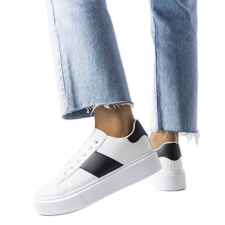 White sneakers with a black stripe from Aurélie