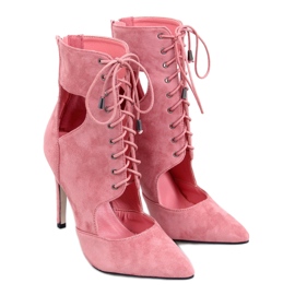 Boots cut out on a Demi Rosa pin pink