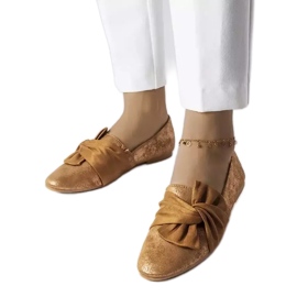 Brown metallic ballerinas with a bow from Dodier golden