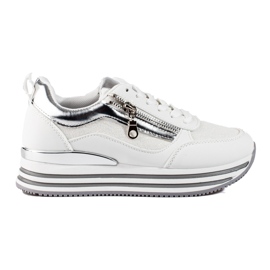 White and silver sneakers on the Shelovet platform