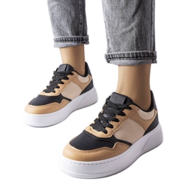 Black and beige boots with a thicker sole from Baron