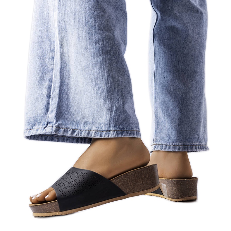 Black openwork wedge sliders from Bourque