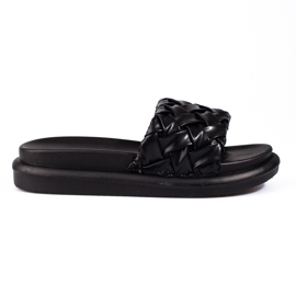 Black slippers on a thick Shelovet platform