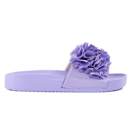 Purple flip flops on the Shelovet platform