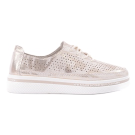 Women's leather openwork shoes on the Shelovet golden platform