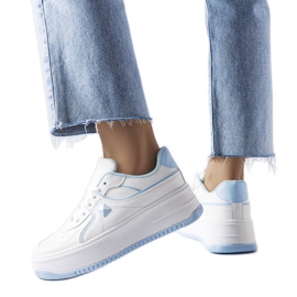 White and blue sneakers on the Lepage platform