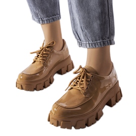 Brown patent leather shoes from Beccadelli