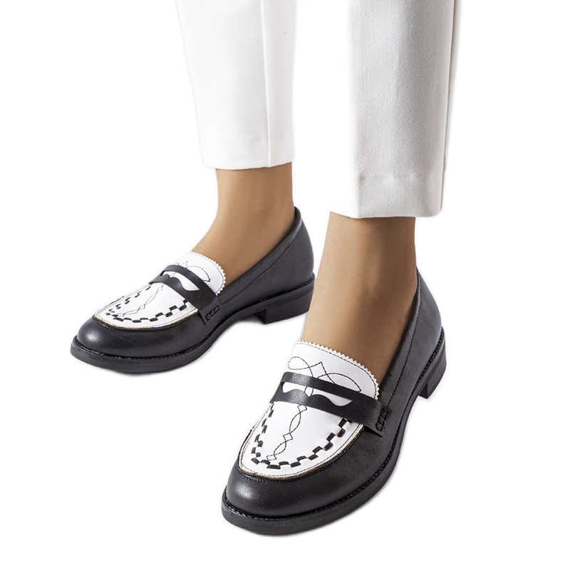Black loafers with a white insert from Galboun