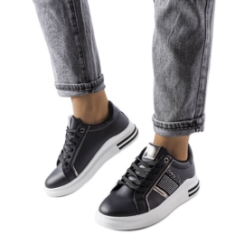 Black sneakers decorated with Xarles rhinestones Black sneakers decorated with Xarles rhinestones