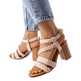 Beige sandals with braided straps from Octave Beige sandals with braided straps from Octave