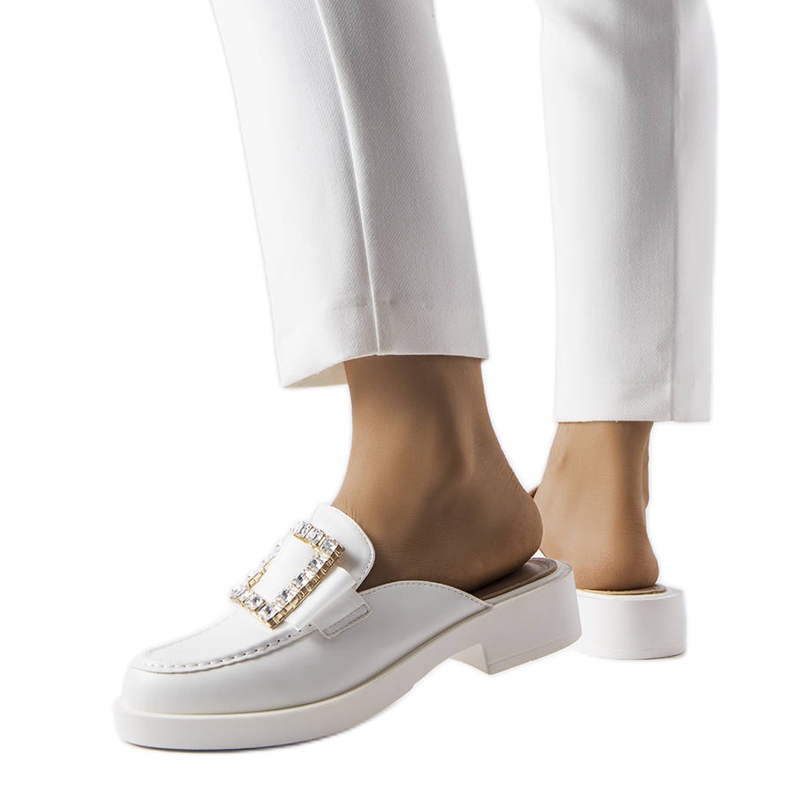 White flip flops with a built-in toe from Columbus