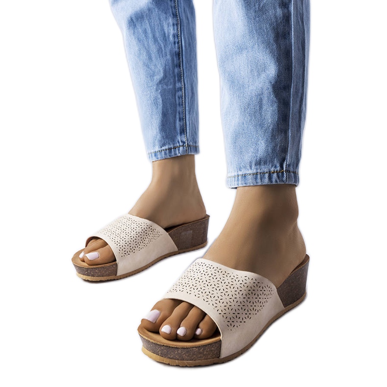 Beige openwork wedge sandals from Bourque