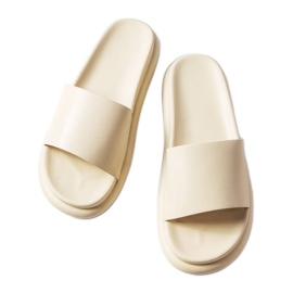 Beige slippers on the platform Beige slippers on the platform