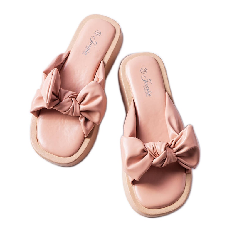 Pink platform sandals with a bow from Edvard