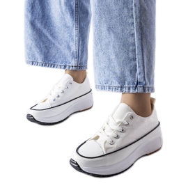 White sports sneakers on the McKeylor platform