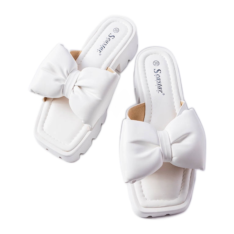 Seastar White sliders with tractor soles from Bossé