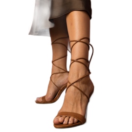 Brown lace-up sandals from Aceline