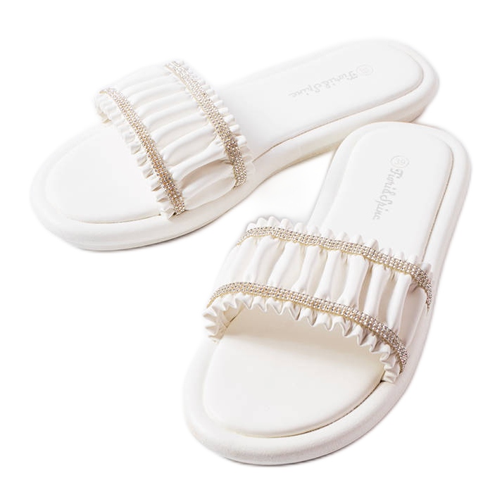 White sliders with ruffles and cubic zirconias from Anapor