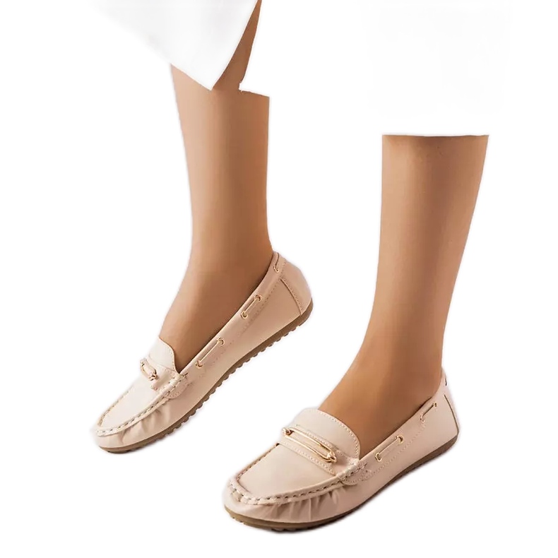BM Beige loafers decorated with the Seattle appliqué