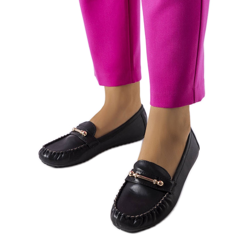 Black loafers with a matte finish from Sorel