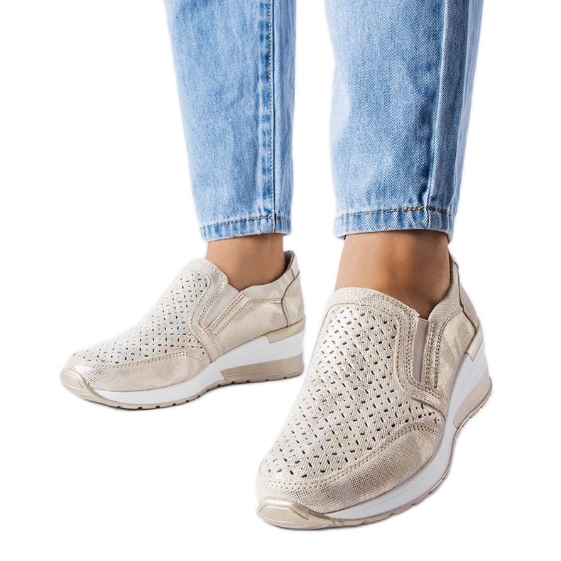 Golden openwork wedge sneakers from Vernon