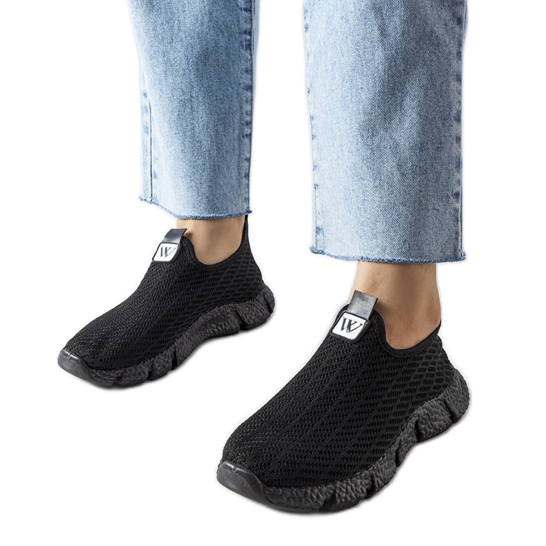 Black slip-on sneakers from Yellville