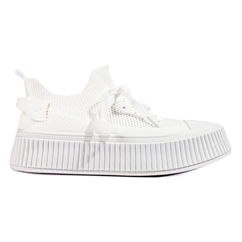 White openwork sneakers on the Shelovet platform