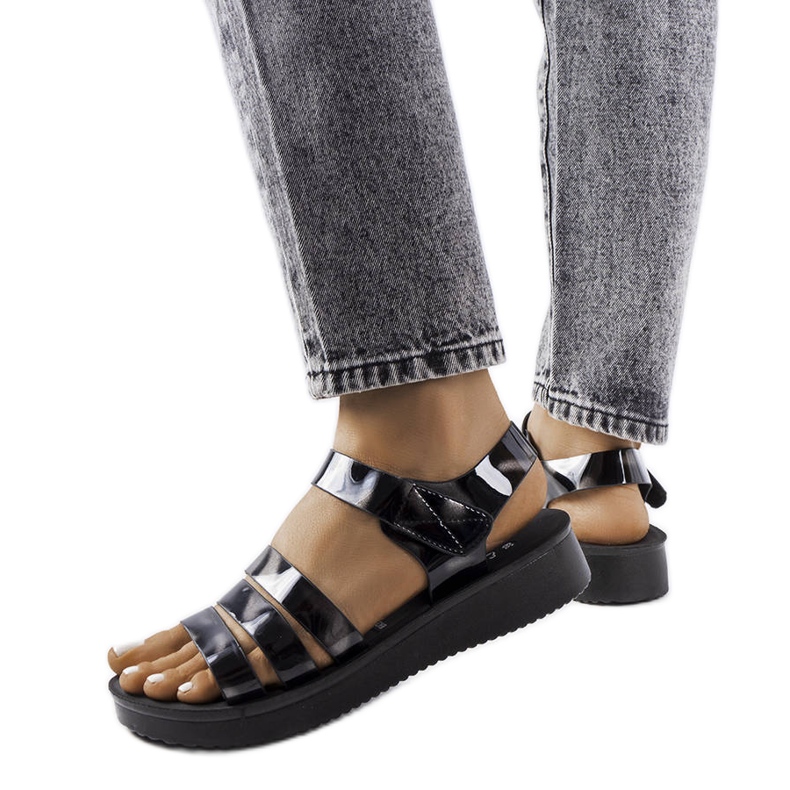 Black lacquered wedge sandals from Covillon