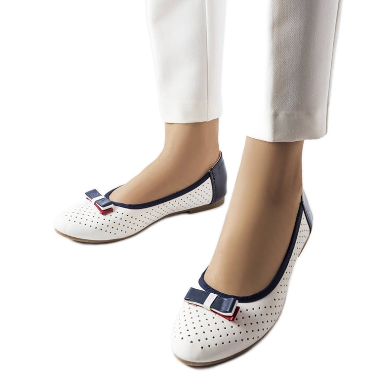 White openwork ballerinas with a Tisser bow