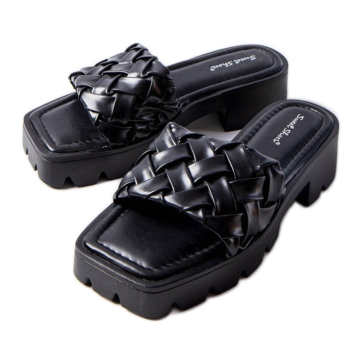 Black slippers with tractor soles from Lora