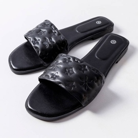 Black flat sandals from Amalie